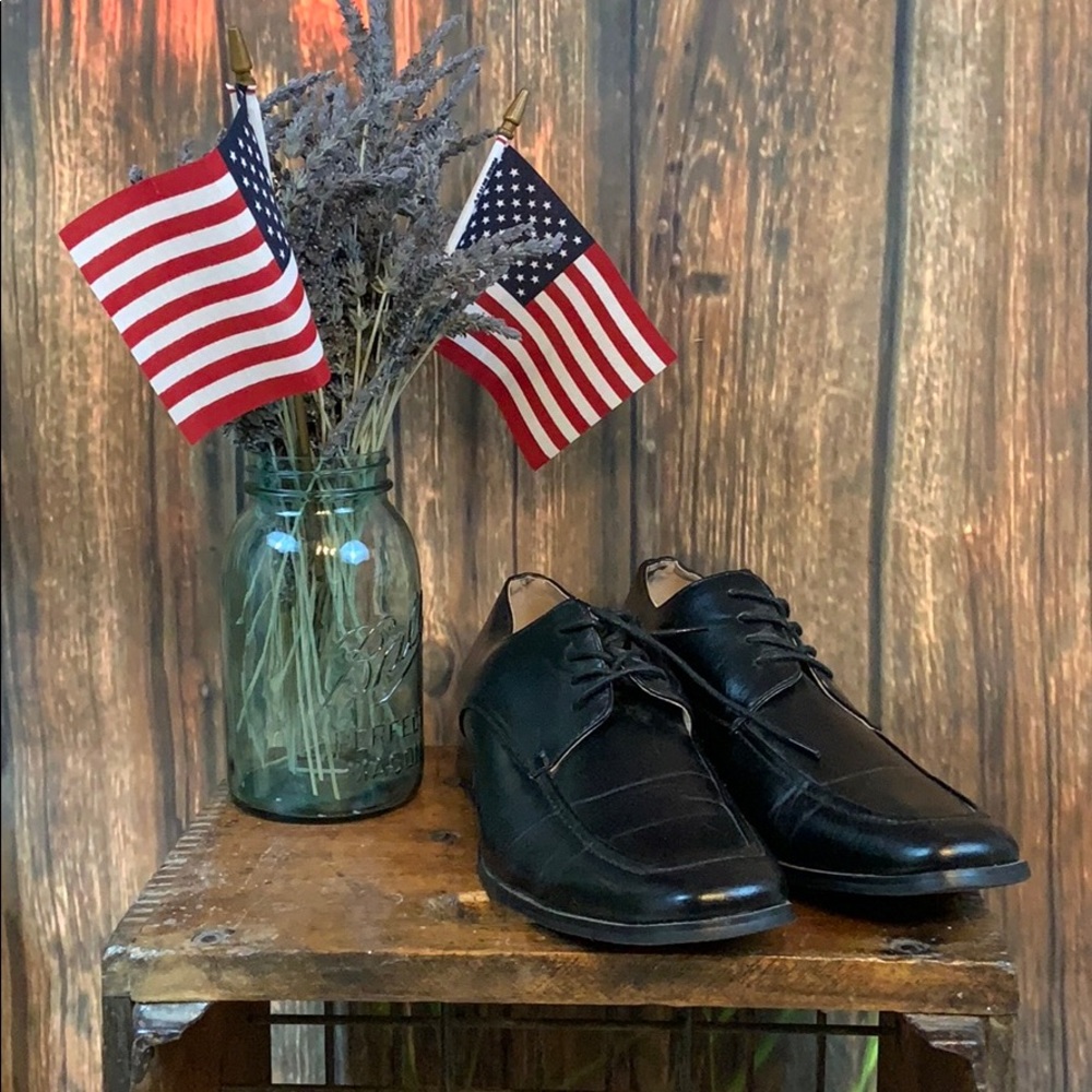 Men’s black dress shoes.